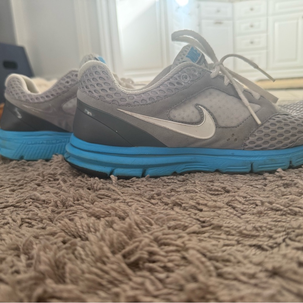 Nike women’s Gray and Blue Athletic Shoes